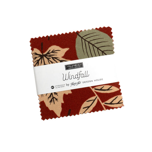Fabric swatch with leaf pattern and 'Moda' label on a white background