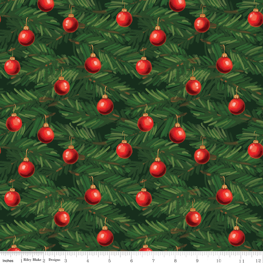 A repeating Christmas tree branch pattern with green pine needles and red ornament illustrations, shown as a fabric or wallpaper print. A small ruler strip along the bottom edge shows scale.