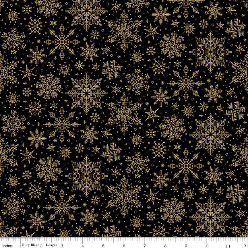 Pattern of gold snowflakes on a black background