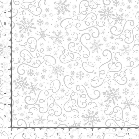White fabric with decorative scrolls and snowflakes on a white background